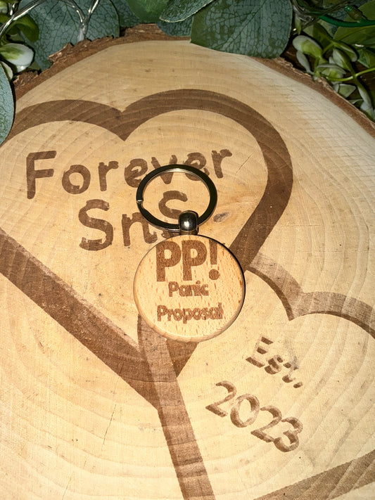 DEZBAG “PP Panic Proposal” Circle Wooden Keyring